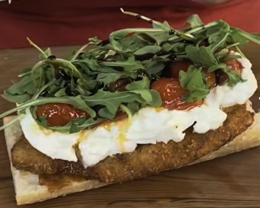 Fried Pork Cutlet with tomatoes, arugula, and burrata